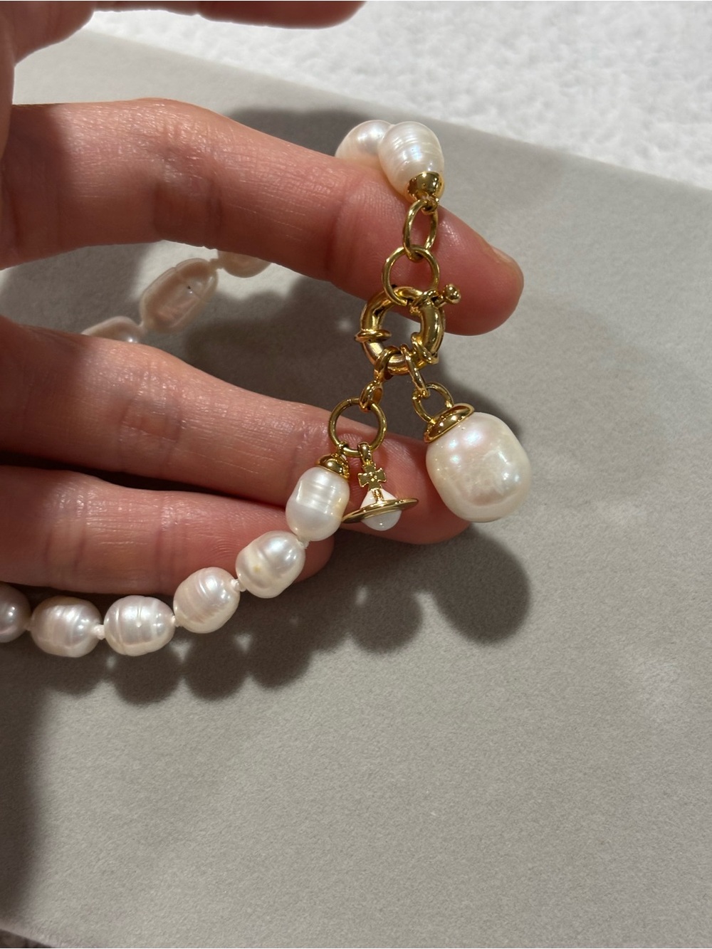 Vivienne Westwood White Pearl Bracelet with Gold Charm - Picture 5 of 10